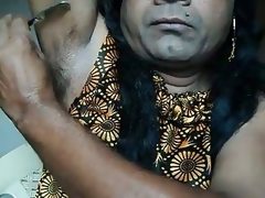 Indian girl shaving armpits hair by..